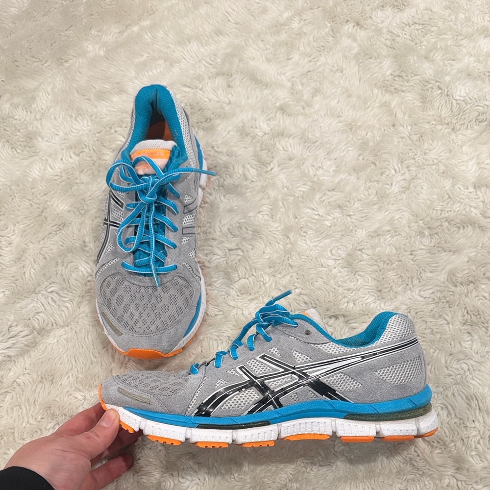 Asics Gel-Neo 33 running shoes Woman's Sneakers Size 8 Gray, Blue, and orange.